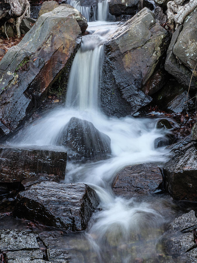 Small waterfall with blurred water movement. Photograph by Rob Huntley