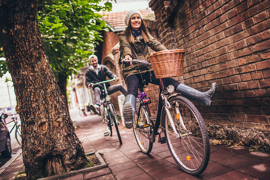 Smiling bike riders Photograph by AleksandarNakic