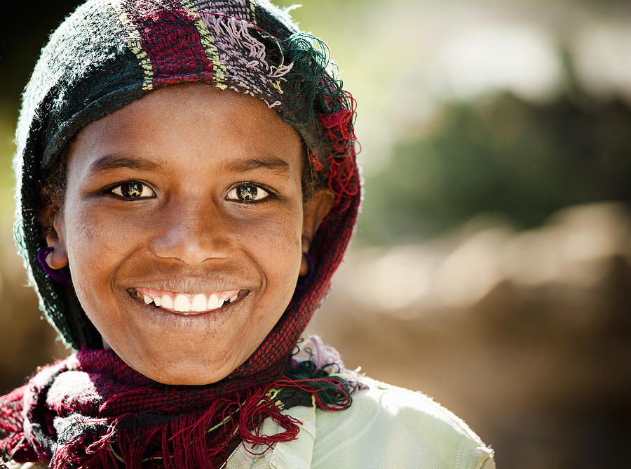 Smiling Ethiopian girl with shawl. Photograph by Tyler Stableford