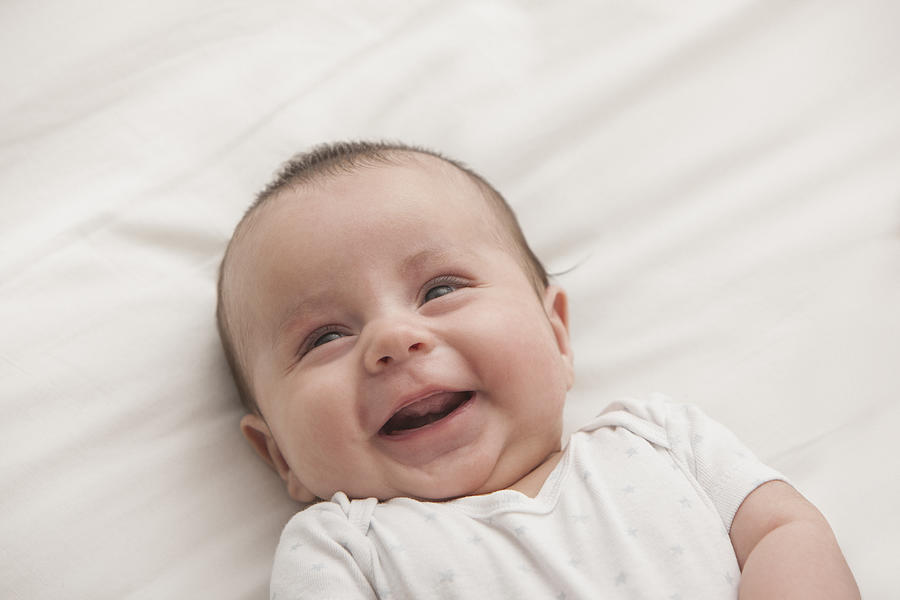 Smiling Newborn Photograph by Jose Luis Pelaez
