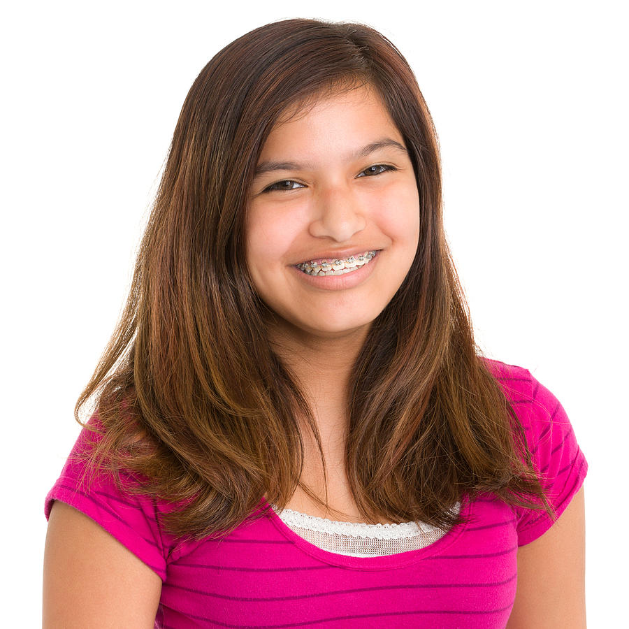 Smiling Teenage Girl With Braces Photograph by Drbimages