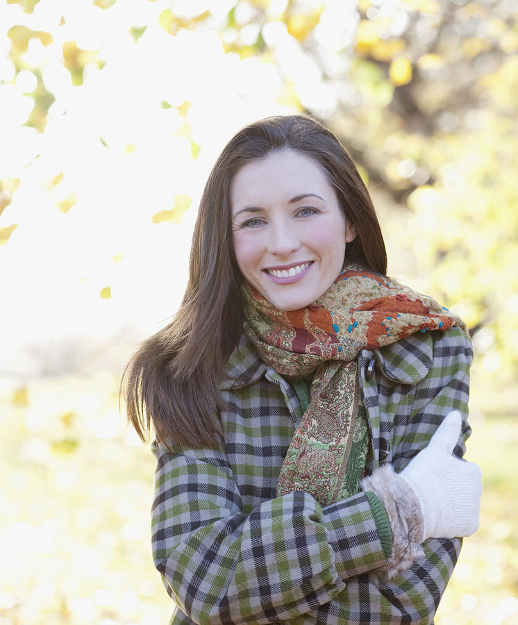 Smiling woman outdoors in autumn Photograph by Sam Edwards