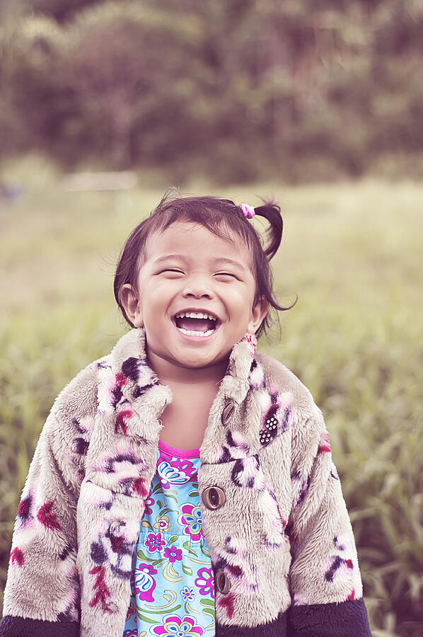 Smiling young Asian girl Photograph by Gilbert Rondilla Photography