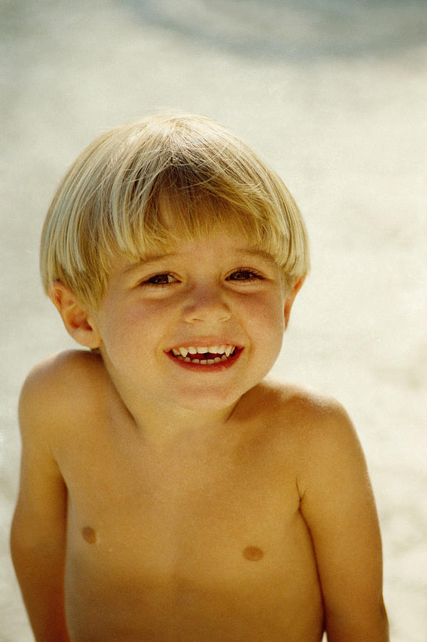 Smiling Young Blond Boy Photograph by Benn Mitchell