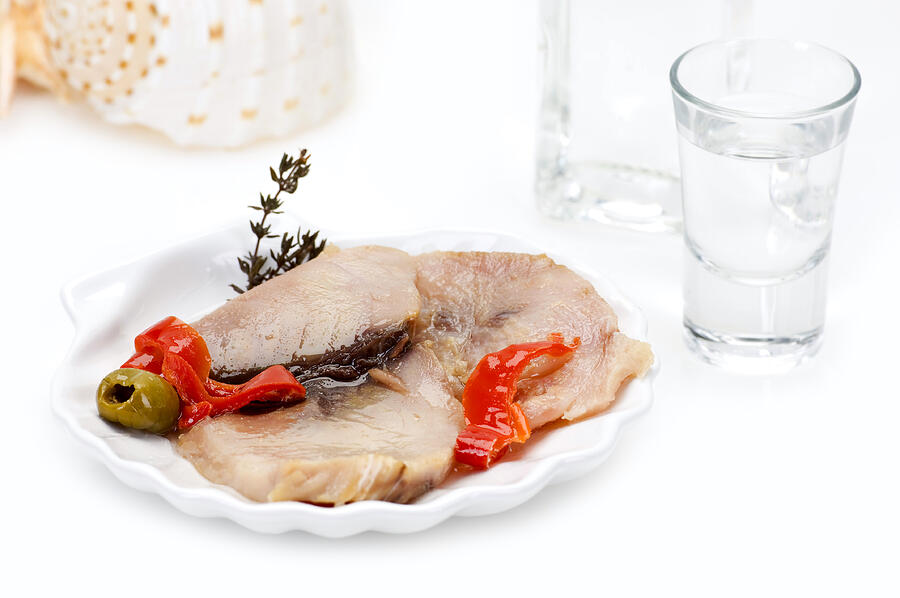 Smoked Fish Fillet And Ouzo Photograph by Tolisma