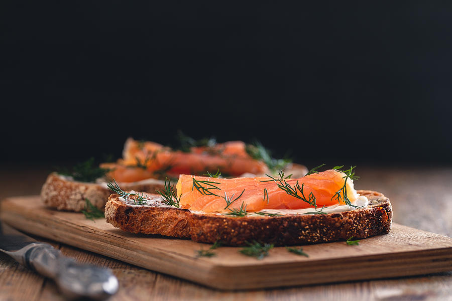 Smoked salmon sandwich appetizer with toasted bread Photograph by Vlad Fishman