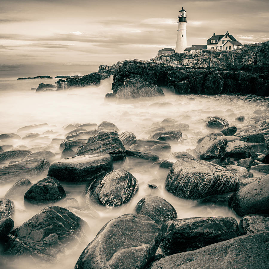 Smooth Ocean Waters Over The Rocks Below Portland Head Lighthouse - Sepia Edition Photograph by Gregory Ballos