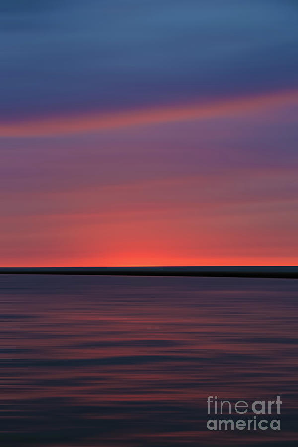 Smooth Sunset Vertical Photograph