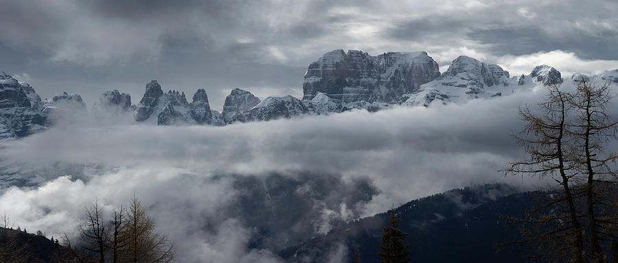 Snow-capped alps mountains in clouds Photograph by Mikhail Kokhanchikov