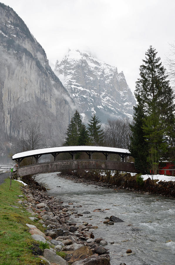 Snow Covered Footbridge in Jungfrau Village of Lauterbrunnen Switzerland Photograph by Shawn OBrien