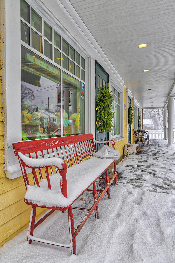 Snow Covered Red Bench at the Marshfiled Hills General Store Photograph by Juergen Roth