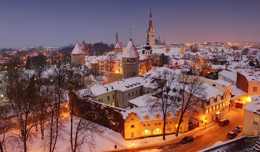 Snow-covered Rooftops in Estonia Photograph by Michael Avina