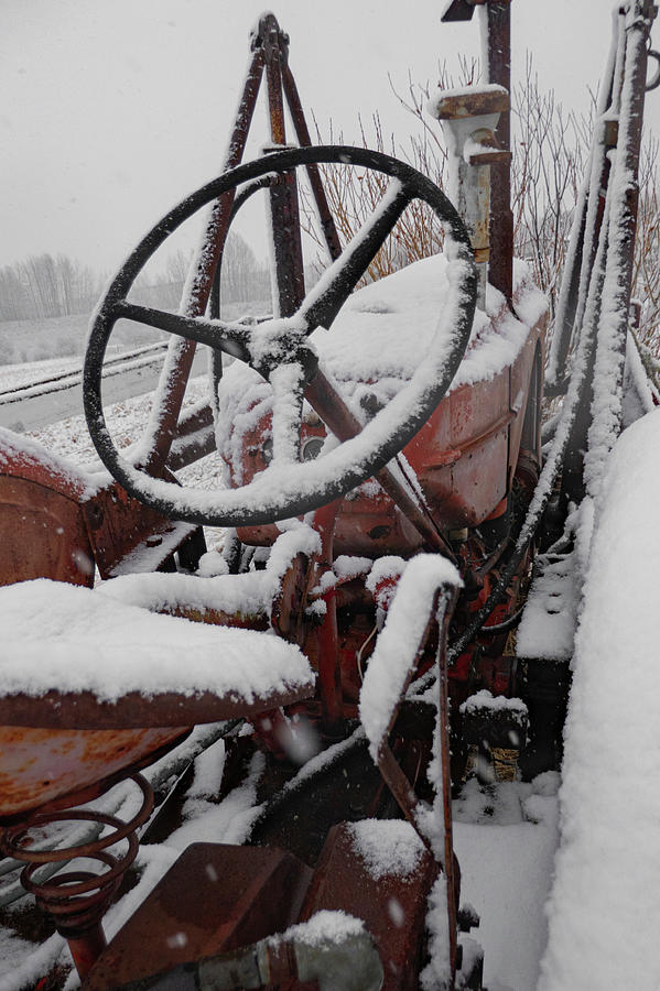 Vintage Photograph - Snow On A Vintage Tractor by Phil And Karen Rispin