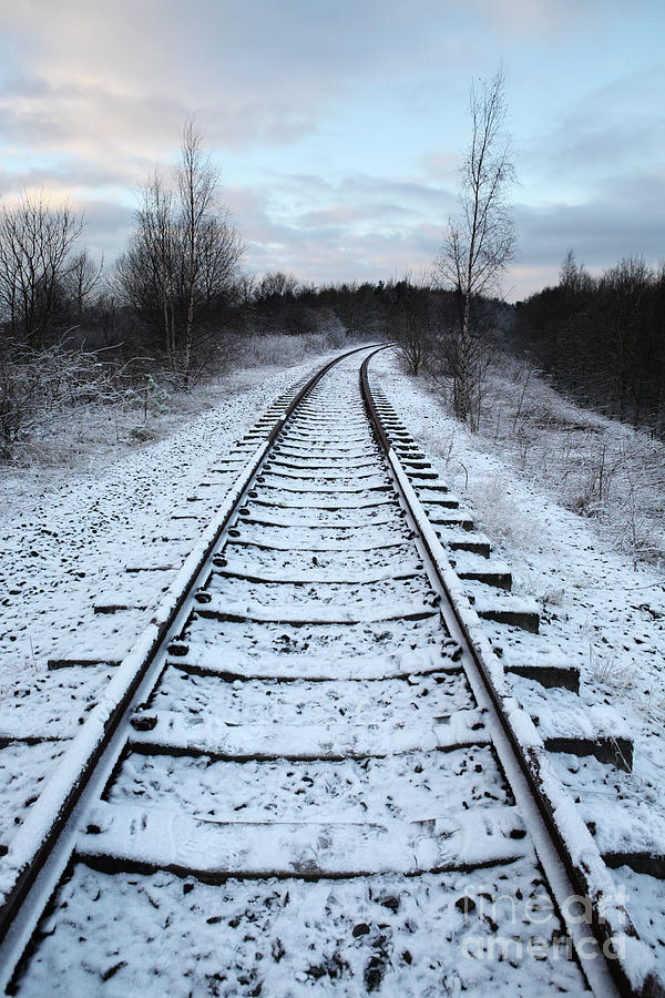 Snow on railway tracks Photograph by Bryan Attewell