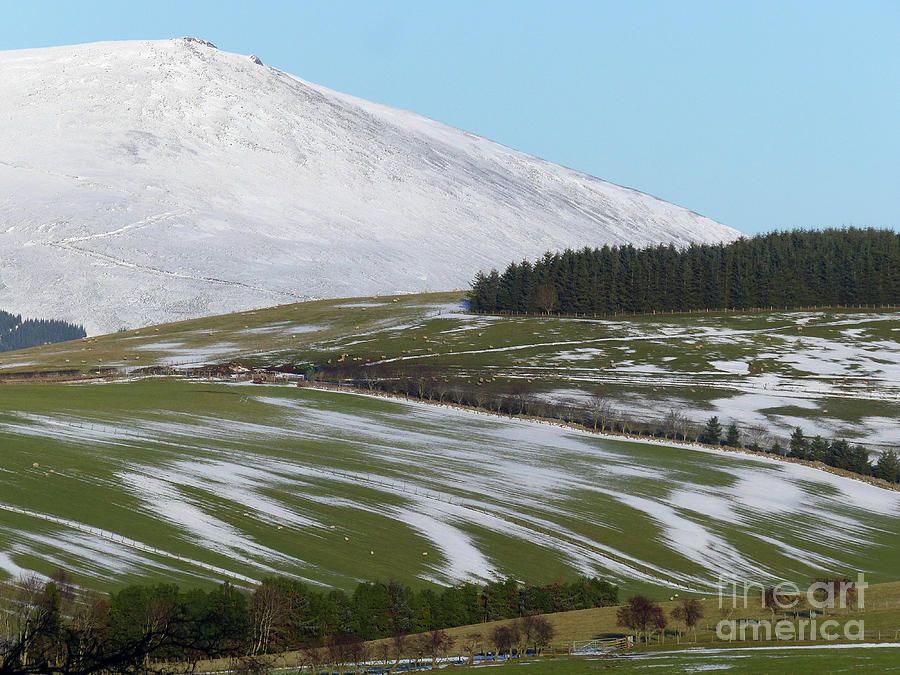 Snow streaks and Ben Rinnes Photograph by Phil Banks