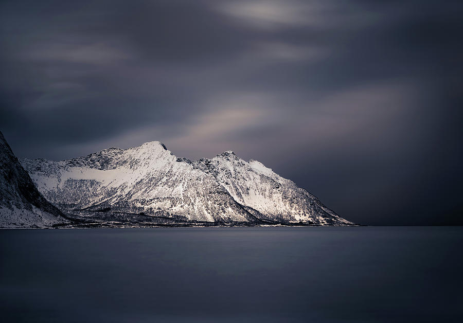 Nature Photograph - Snowcapped mountain range and Norwegian sea in Steinfjord, Senja island, Norway. by Kristian Sekulic