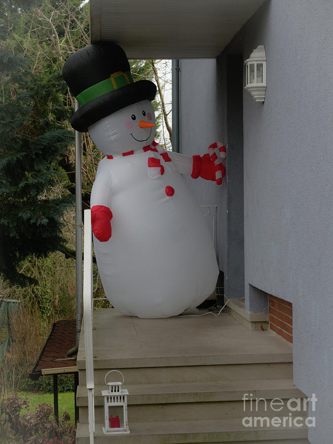 Snowman Comes Home. Photograph by Alexander Vinogradov