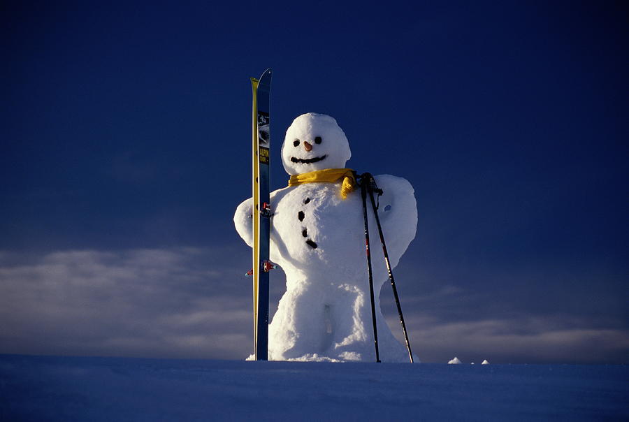 Snowman Holding Skis, Covara, Italy Photograph by Mike Timo