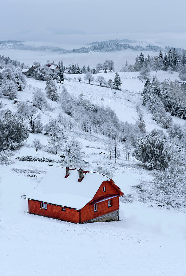 Snowy landscape with little red House Photograph by Jaroslaw Blaminsky