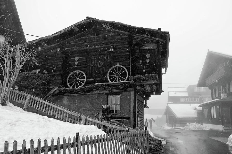 Snowy Street Sceene in the Jungfrau Village of Murren Switzerland Black and White Photograph by Shawn OBrien
