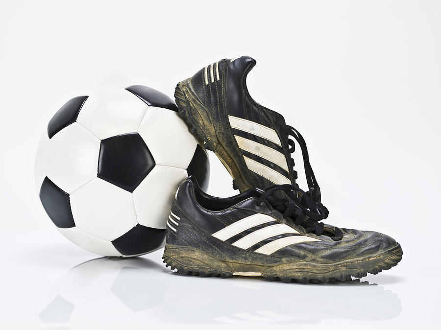 Soccer Ball and Soccer Shoes Photograph by Fuse