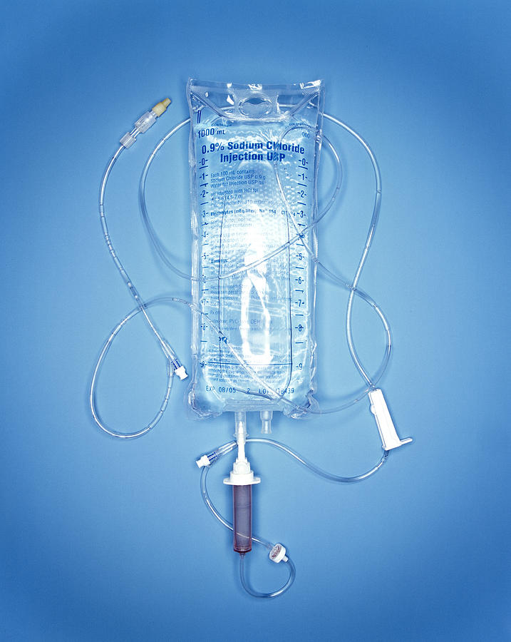 Sodium Chlorde injection bag and tubes, studio shot Photograph by Nicholas Eveleigh
