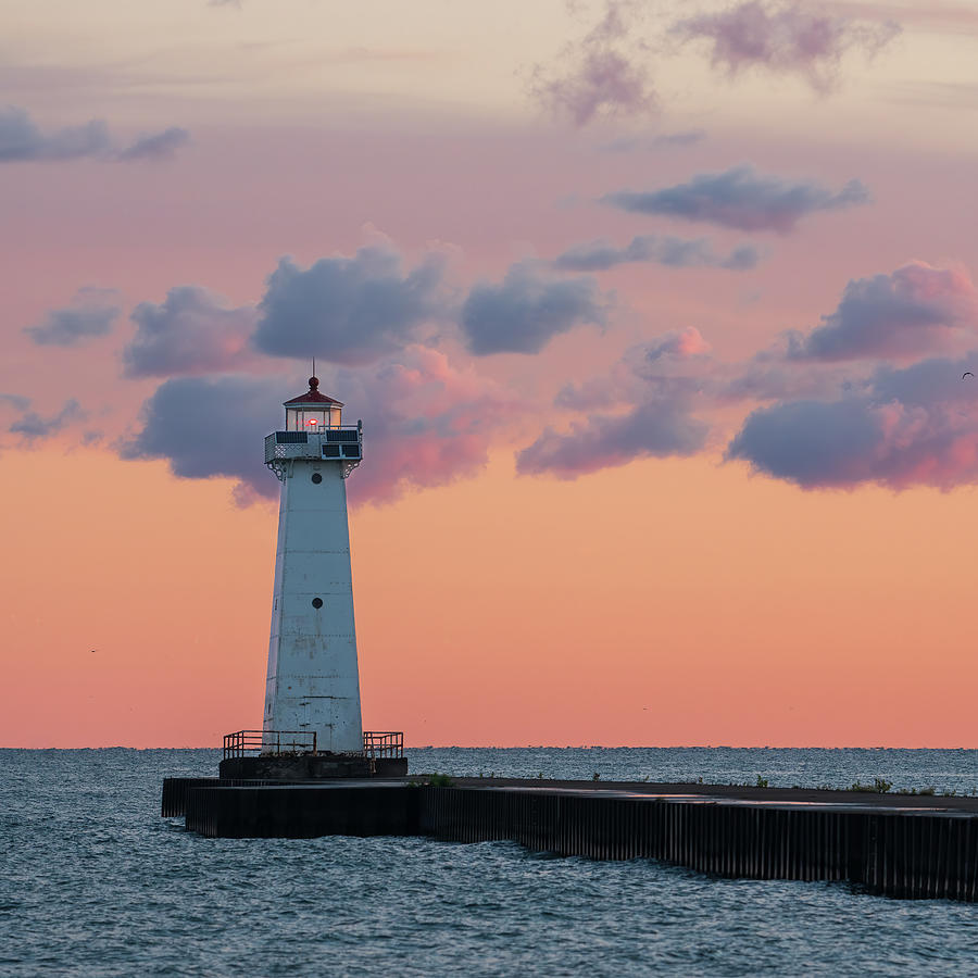 Sodus Bay Lighthouse at dawn. Photograph by Kyle Lee