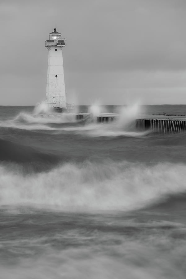 Sodus Bay Lighthouse during a storm. Photograph by Kyle Lee