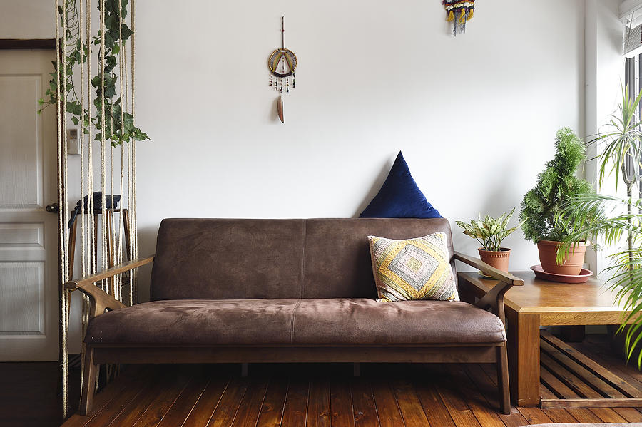 Sofa in a modern nature themed living room Photograph by Carlina Teteris