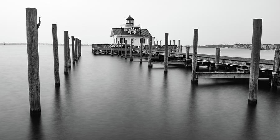Black And White Photograph - Soft Morning Light At Roanoke Marshes Lighthouse - Black And White Panorama by Gregory Ballos