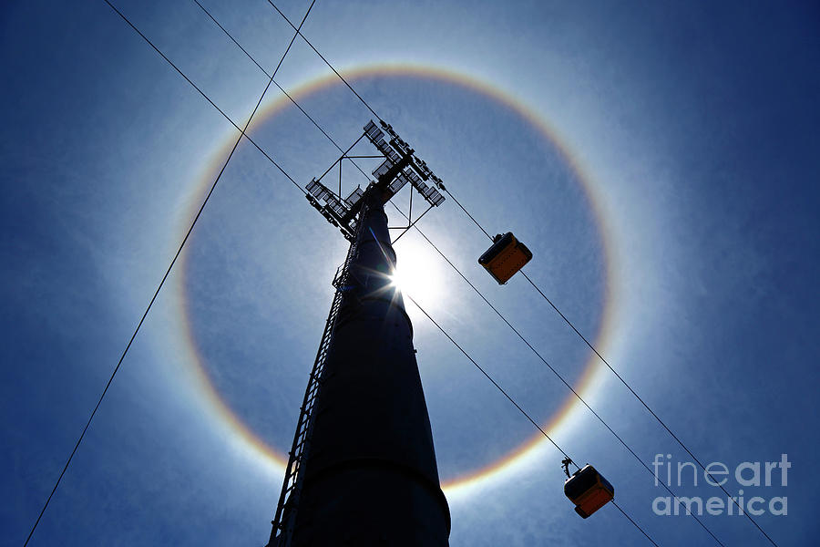 Solar halo and cable cars La Paz Bolivia Photograph by James Brunker