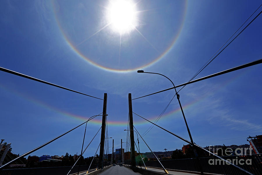 Solar halos and Bridge of the Americas La Paz Bolivia Photograph by James Brunker