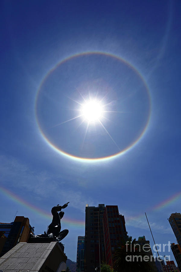 Solar halos over Plaza Avaroa La Paz Bolivia Photograph by James Brunker