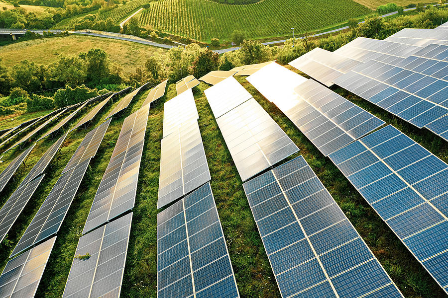 Solar panels fields on the green hills Photograph by LeoPatrizi