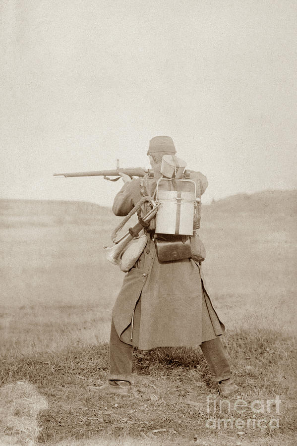 SOLDIER AIMING A RFILE, c1880-90s Photograph by Granger