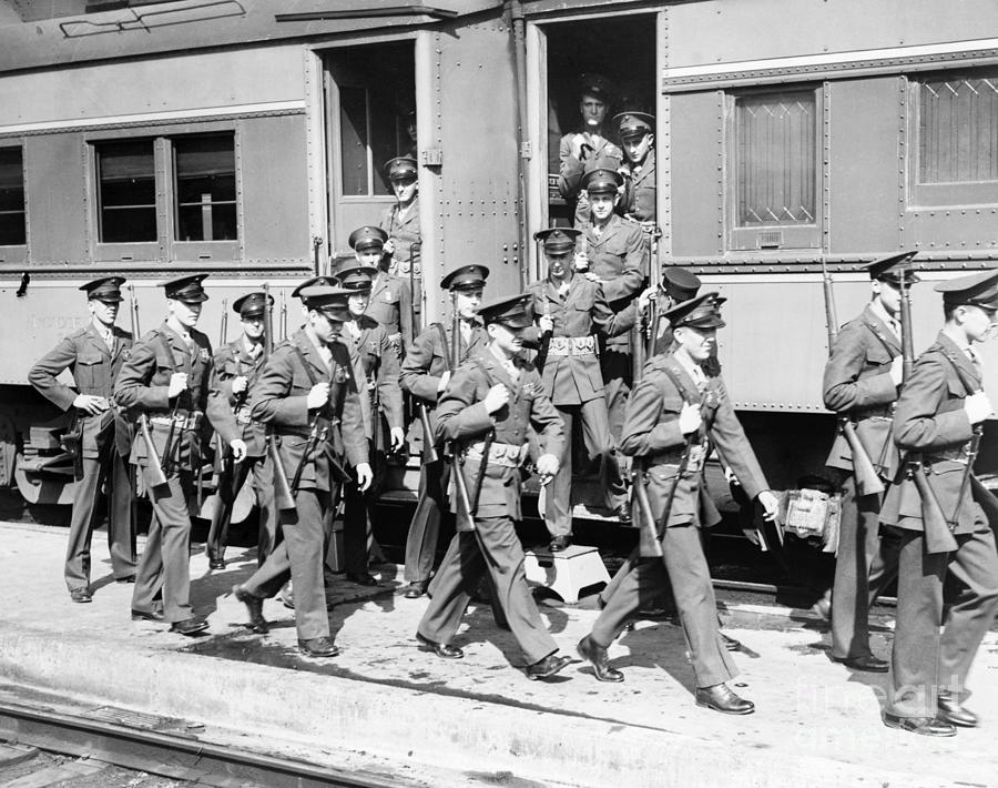 SOLDIERS EXITING PULLMAN CARS, c1942 Photograph by Granger