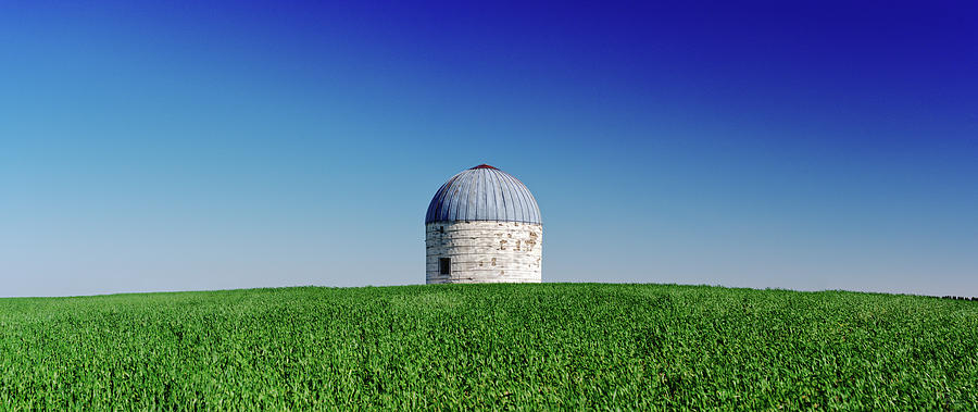 Solitary Silo in a ND wheat field Photograph by Peter Herman