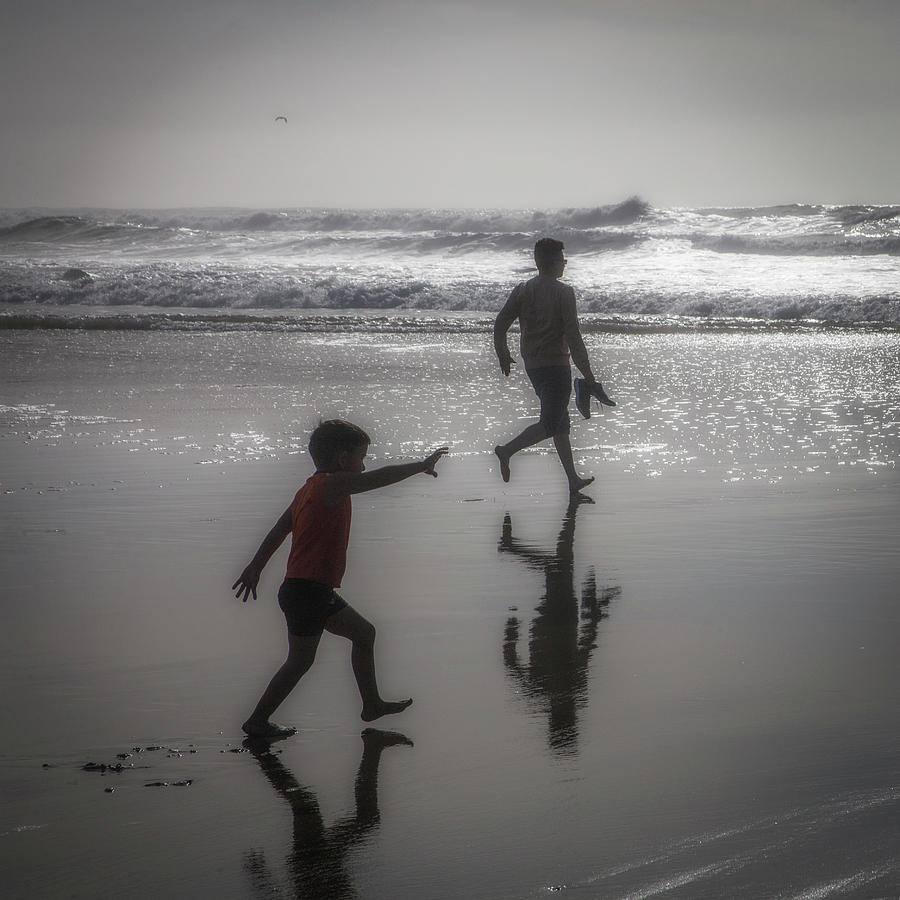Son and dad, Ocean Beach Photograph by Donald Kinney