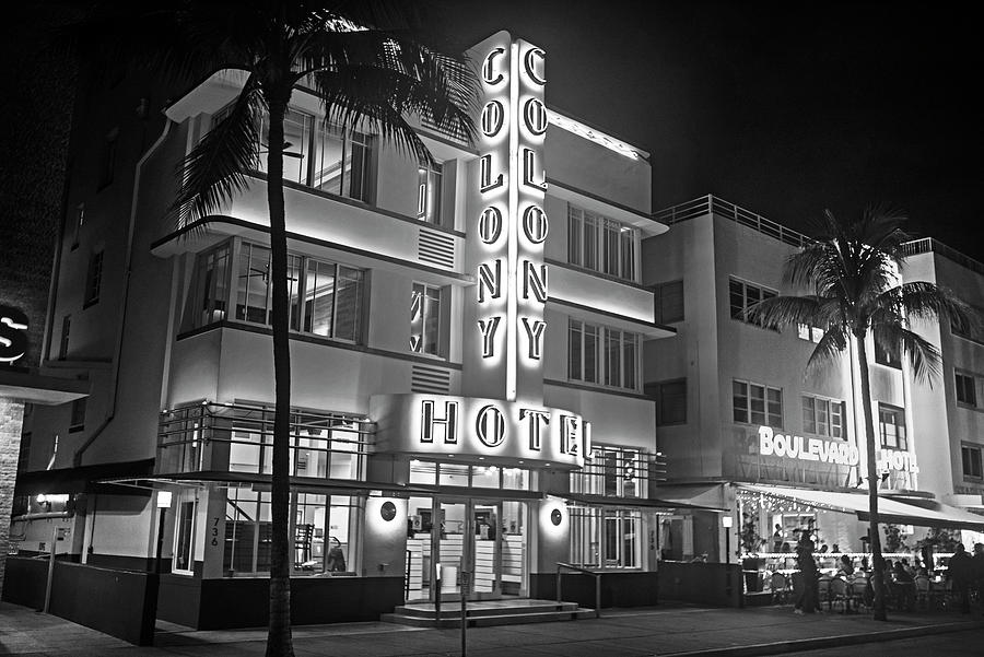 South Beach Florida at Night. Beautiful Lighted Art Deco Buildings Black and White Photograph by Toby McGuire
