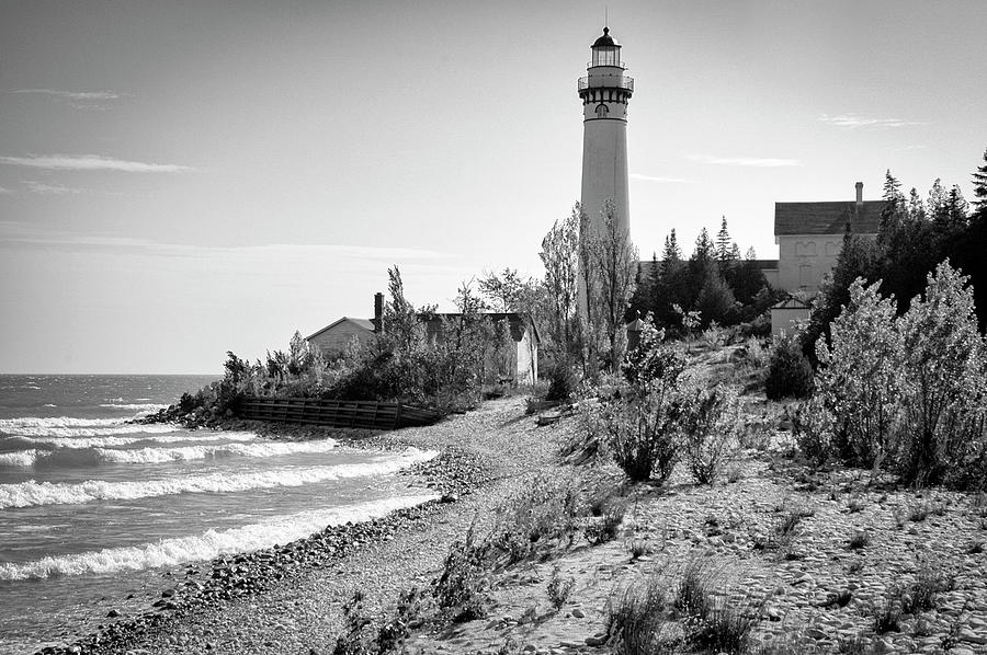 Black And White Photograph - South Manitou Island LIghthouse in Lake Michigan by Mary Lee Dereske