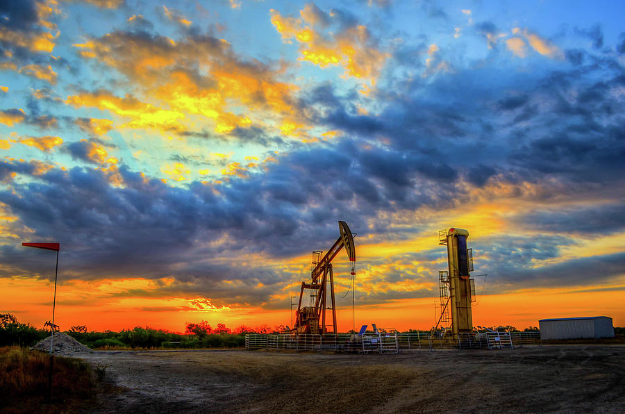 Sunset Photograph - South Texas Pumping Units by Tim Singley