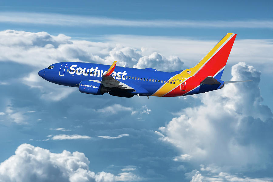 Southwest Airlines Above the Clouds Mixed Media by Erik Simonsen