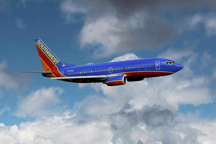 Southwest Airlines Among the Clouds Mixed Media by Erik Simonsen