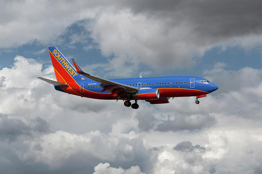 Southwest Airlines Boeing 737 Landing at Orange County Airport Mixed Media by Erik Simonsen