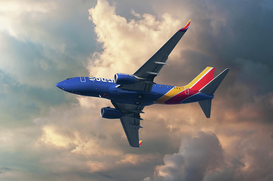 Southwest Airlines Colors Join the Sunset Photograph by Erik Simonsen
