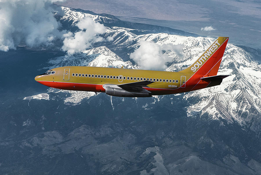 Southwest Airlines Over Snow Capped Mountains Mixed Media by Erik Simonsen