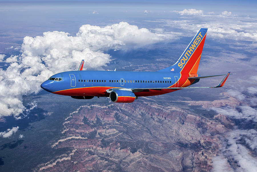 Southwest Airlines Over the Grand Canyon Mixed Media by Erik Simonsen