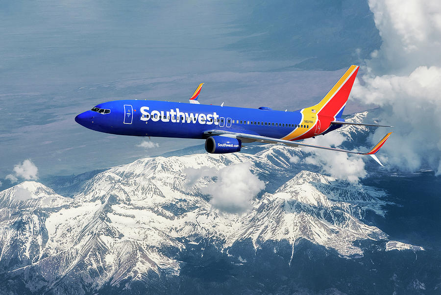 Southwest Boeing 737-8H4 Over Snowcapped Mountains Mixed Media by Erik Simonsen