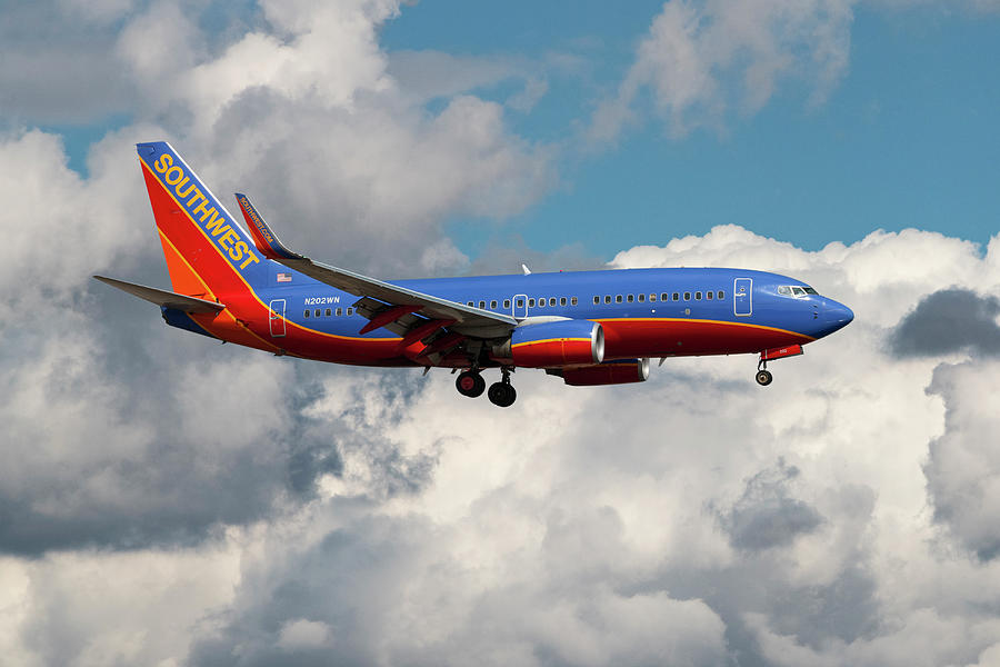 Southwest Boeing 737 Landing at Orange County Airport Photograph by Erik Simonsen