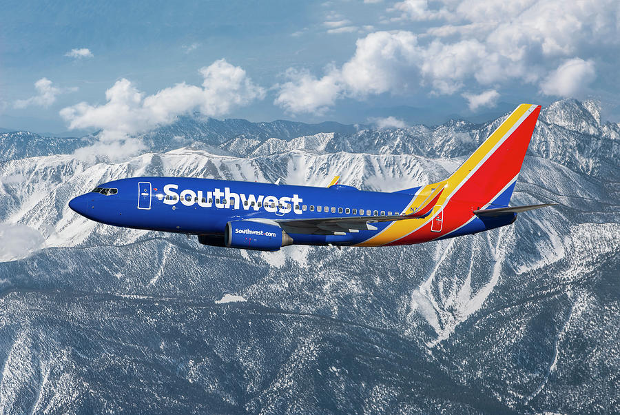 Southwest Boeing 737 Over Snowcapped Mountains Mixed Media by Erik Simonsen